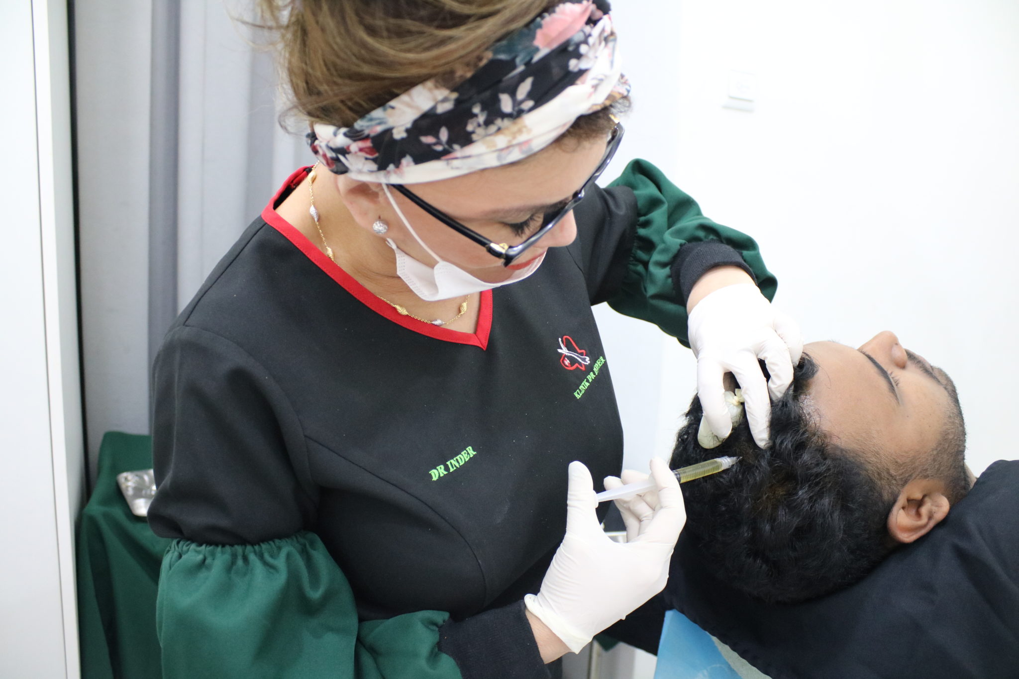 Dr Inder doing Hair Loss Treatment to patient